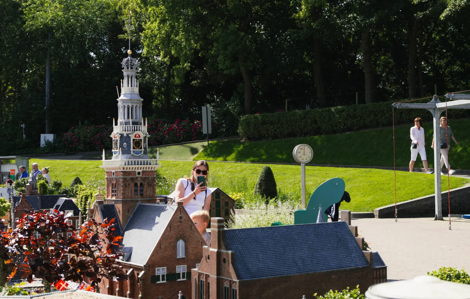 Traditional Dutch windmill surrounded by flowers at Madurodam