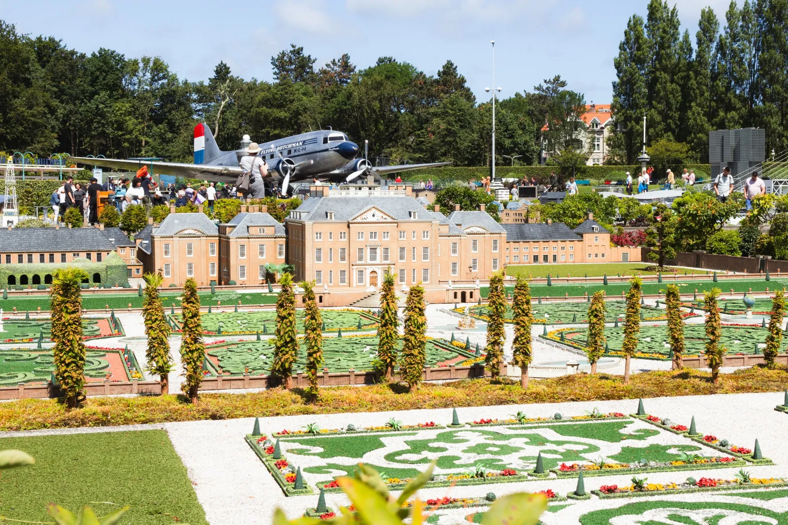 Series of Dutch windmills beside a miniature waterway at Madurodam