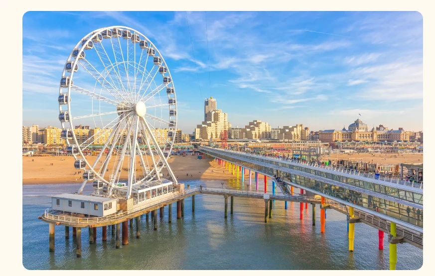 SkyView Ferris wheel and De Pier in Scheveningen with beach and skyline views